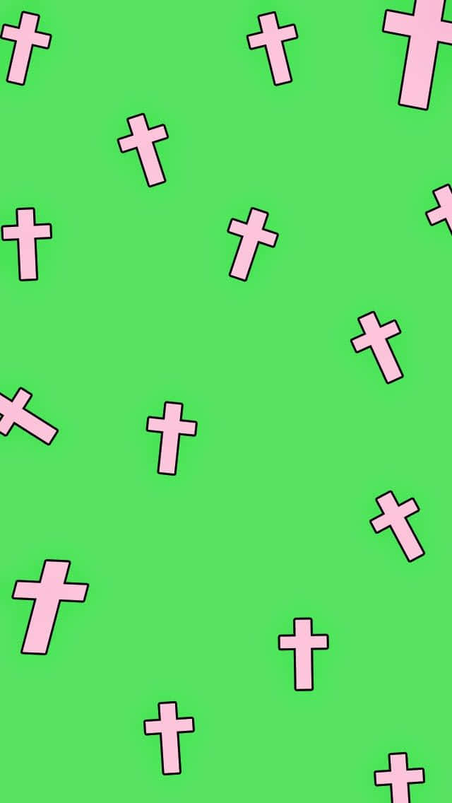 A Pink Cross Pattern On A Green Background Wallpaper