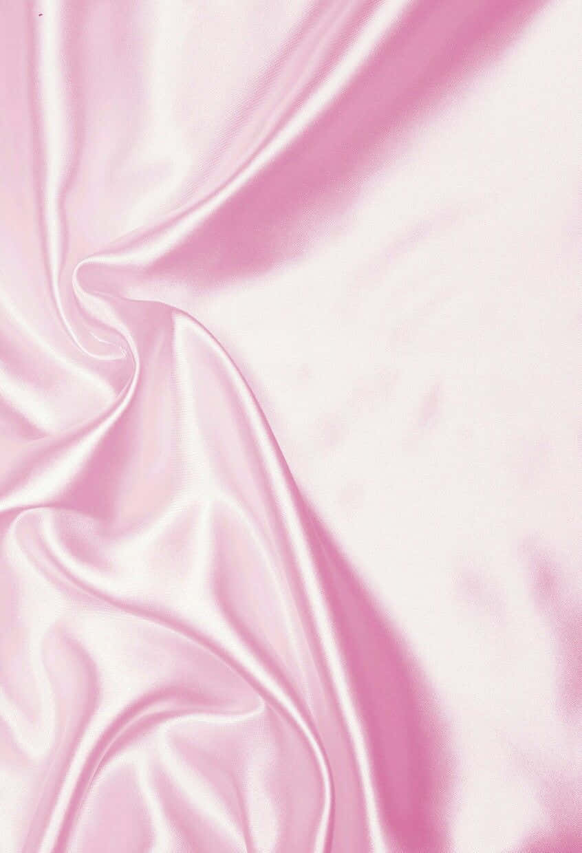 A Pink Satin Fabric With A Smooth Texture Wallpaper