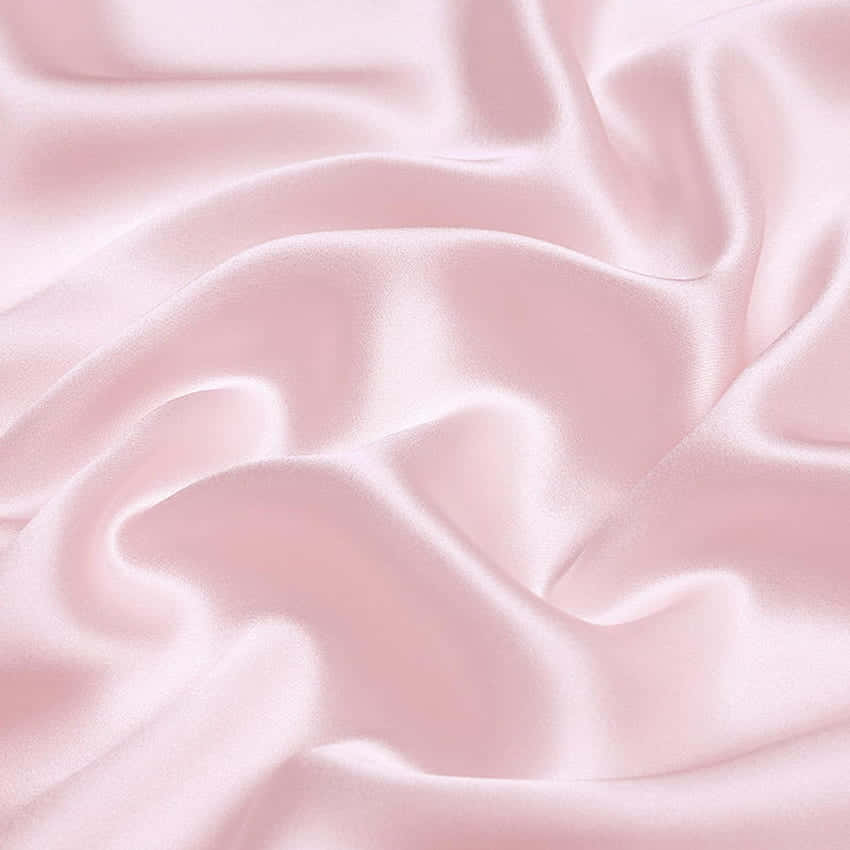 A Pink Satin Fabric With A Smooth Texture Wallpaper