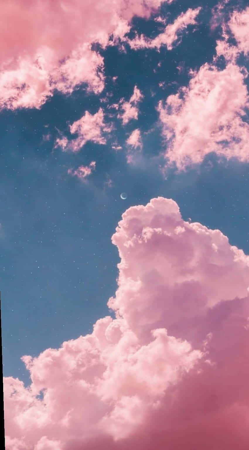 A Pink Sky With Clouds And A Clock Tower Wallpaper