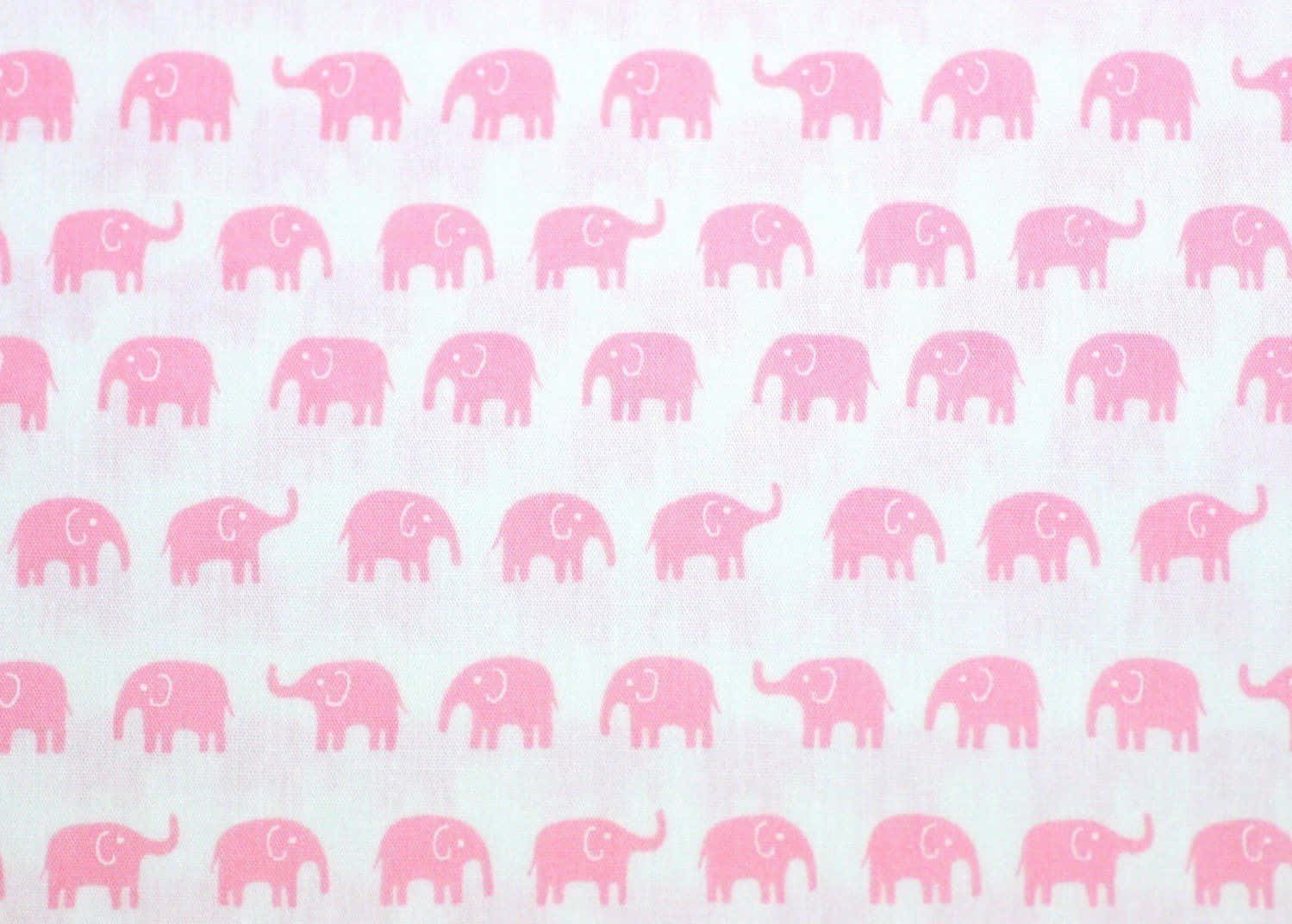 A Playful Pink Elephant In Nature Wallpaper