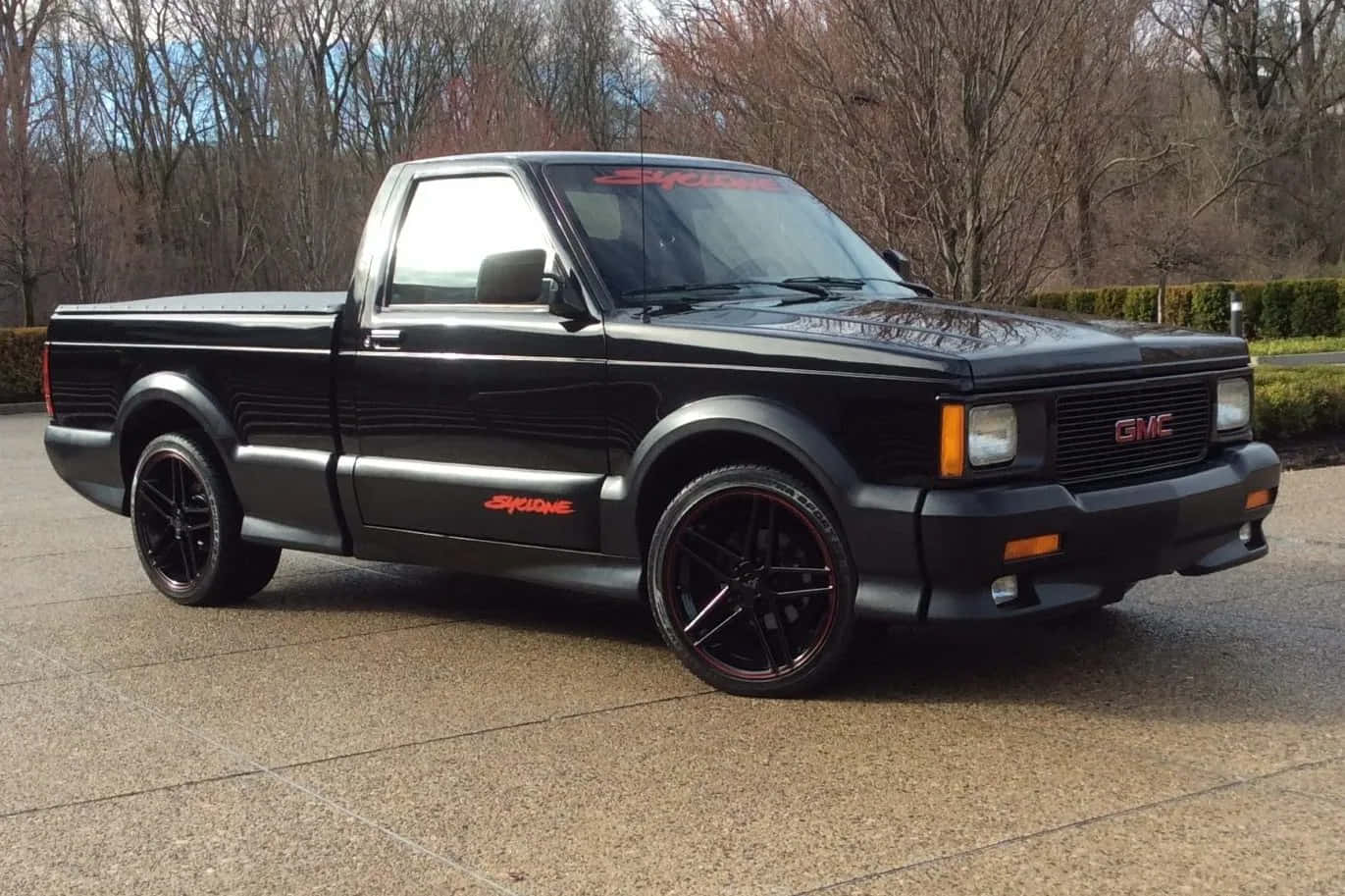 A Powerful Gmc Syclone In Action Wallpaper