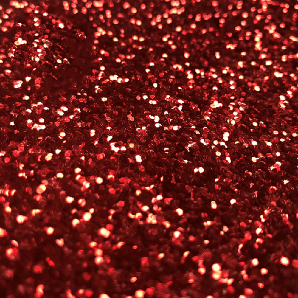 A Radiant Display Of Red Glitter Wallpaper