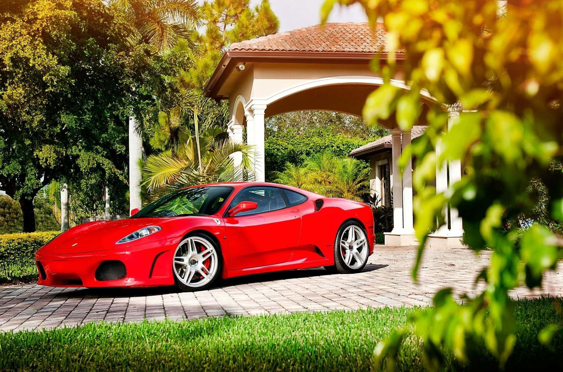 A Red Ferrari F430 On The Road Wallpaper