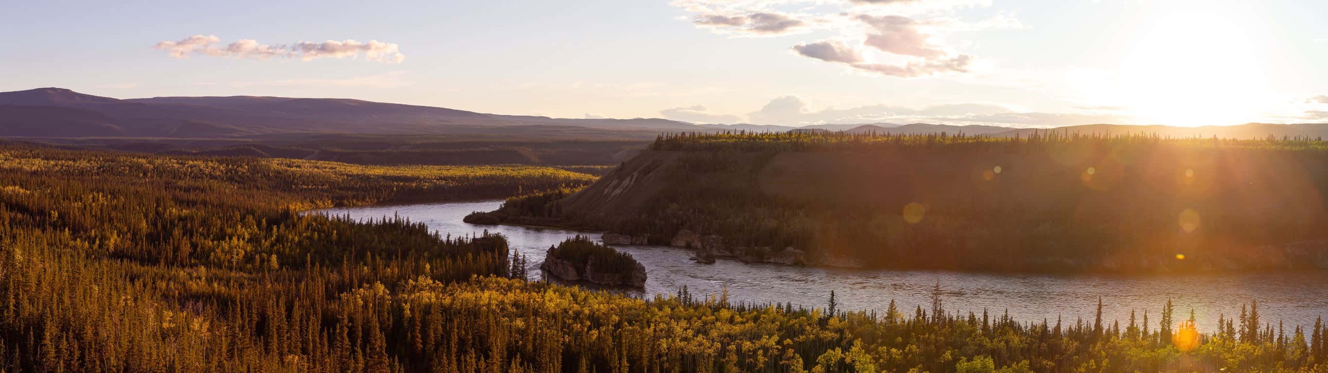 A River And Mountains In The Sun Wallpaper