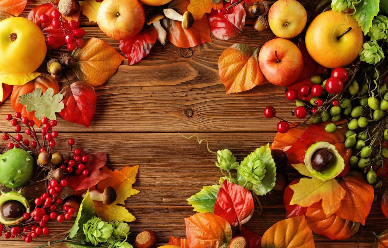 A Rustic Basket Of Fresh Fall Apples Wallpaper