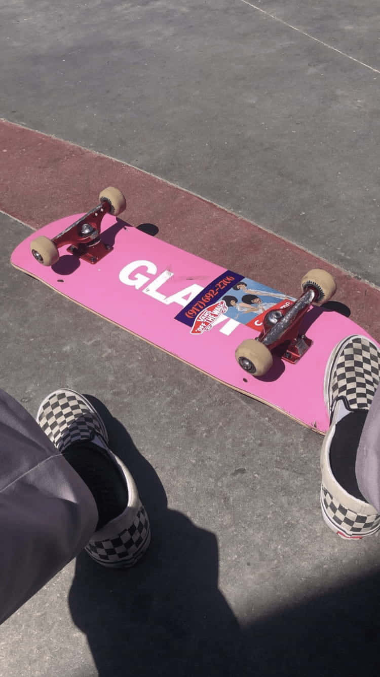 A Silhouette Of A Skater Performing A Kickflip In The Street Wallpaper