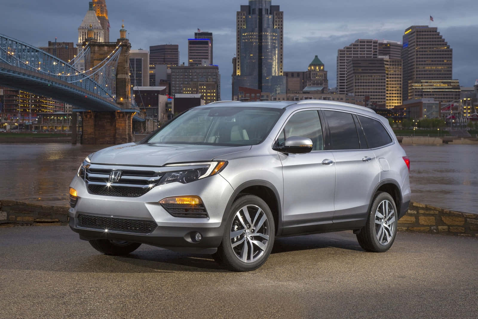 A Sleek And Versatile Honda Pilot On The Road Wallpaper