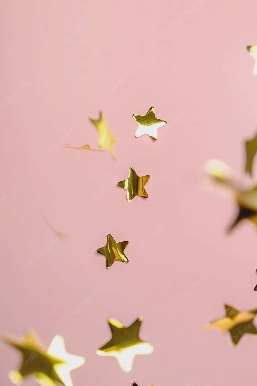 A Soft And Glamorous Combination Of Light Pink And Gold Wallpaper