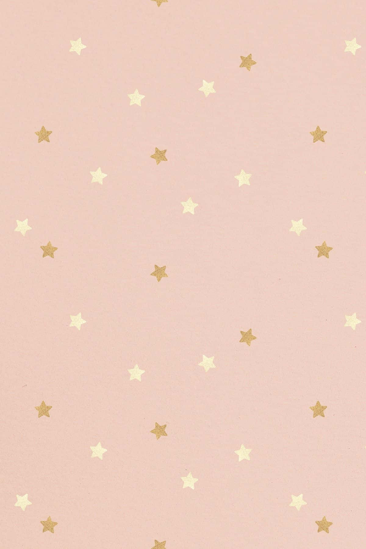 A Soothing Gradient Background Of Light Pink And Gold Wallpaper