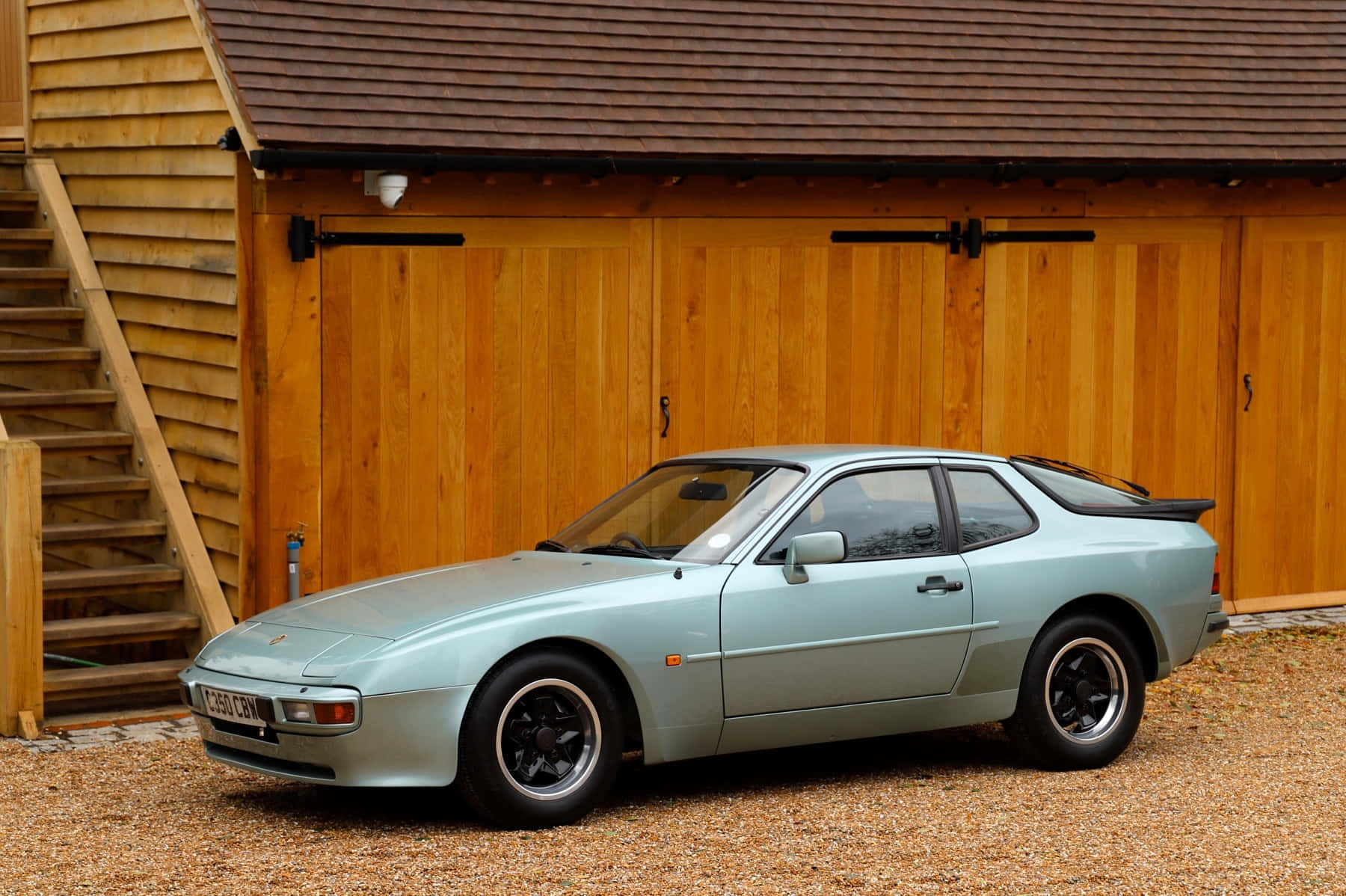 A Spectacular Porsche 944 In Motion Wallpaper