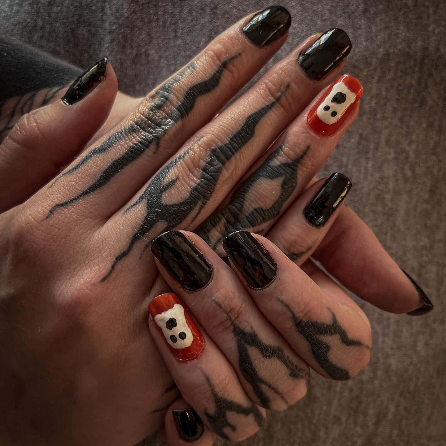 A Spooky Orange And Black Nail Art Design Perfect For Any Halloween Party! Wallpaper