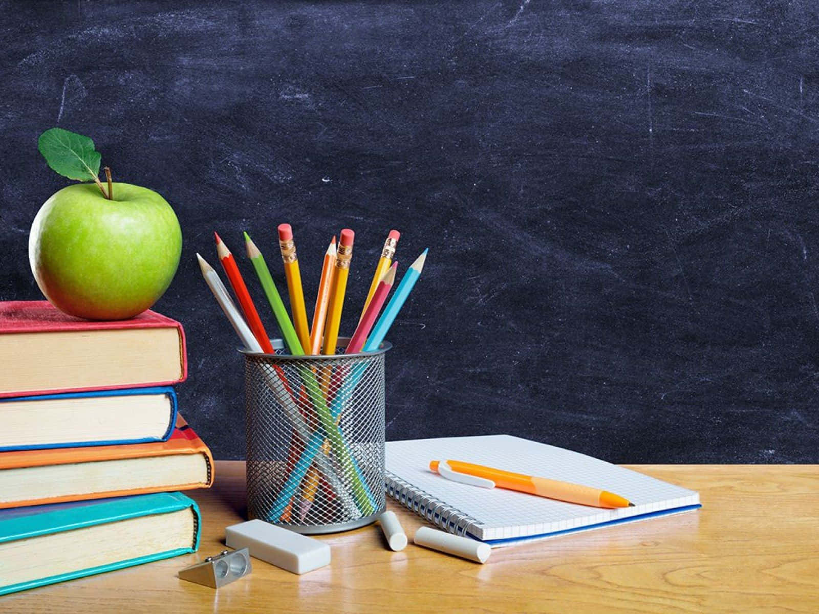 A Stack Of Books And Pencils Wallpaper