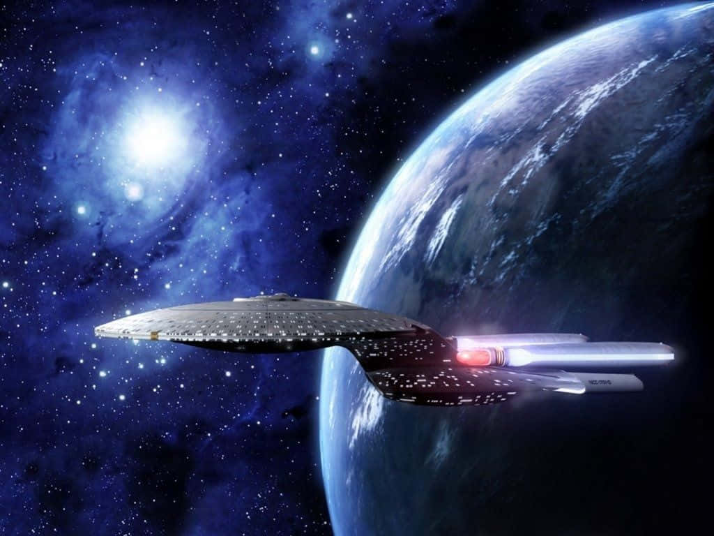 A Starfleet Starship Prepares To Journey Far From Its Home. Wallpaper