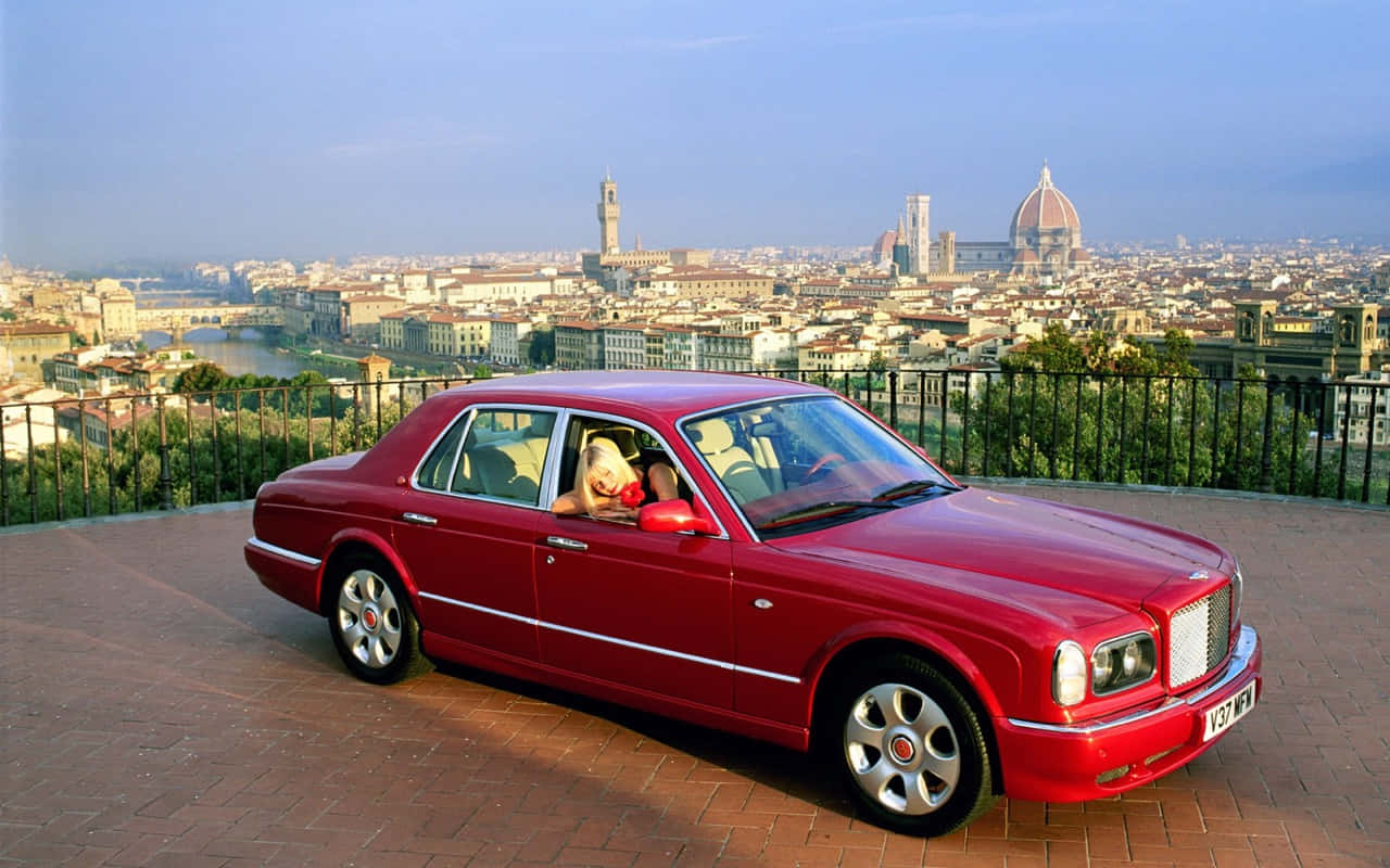 A Stunning Bentley Arnage Glides On The Open Road Wallpaper