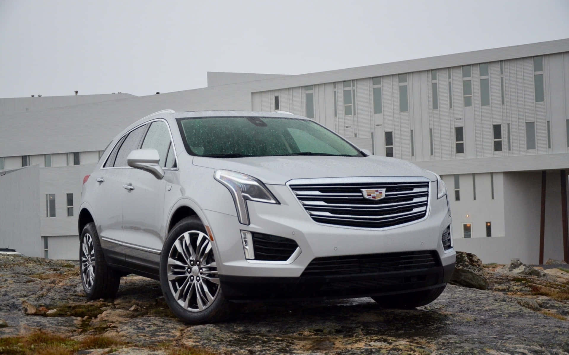 A Stunning Cadillac Xt5 On The Road Wallpaper