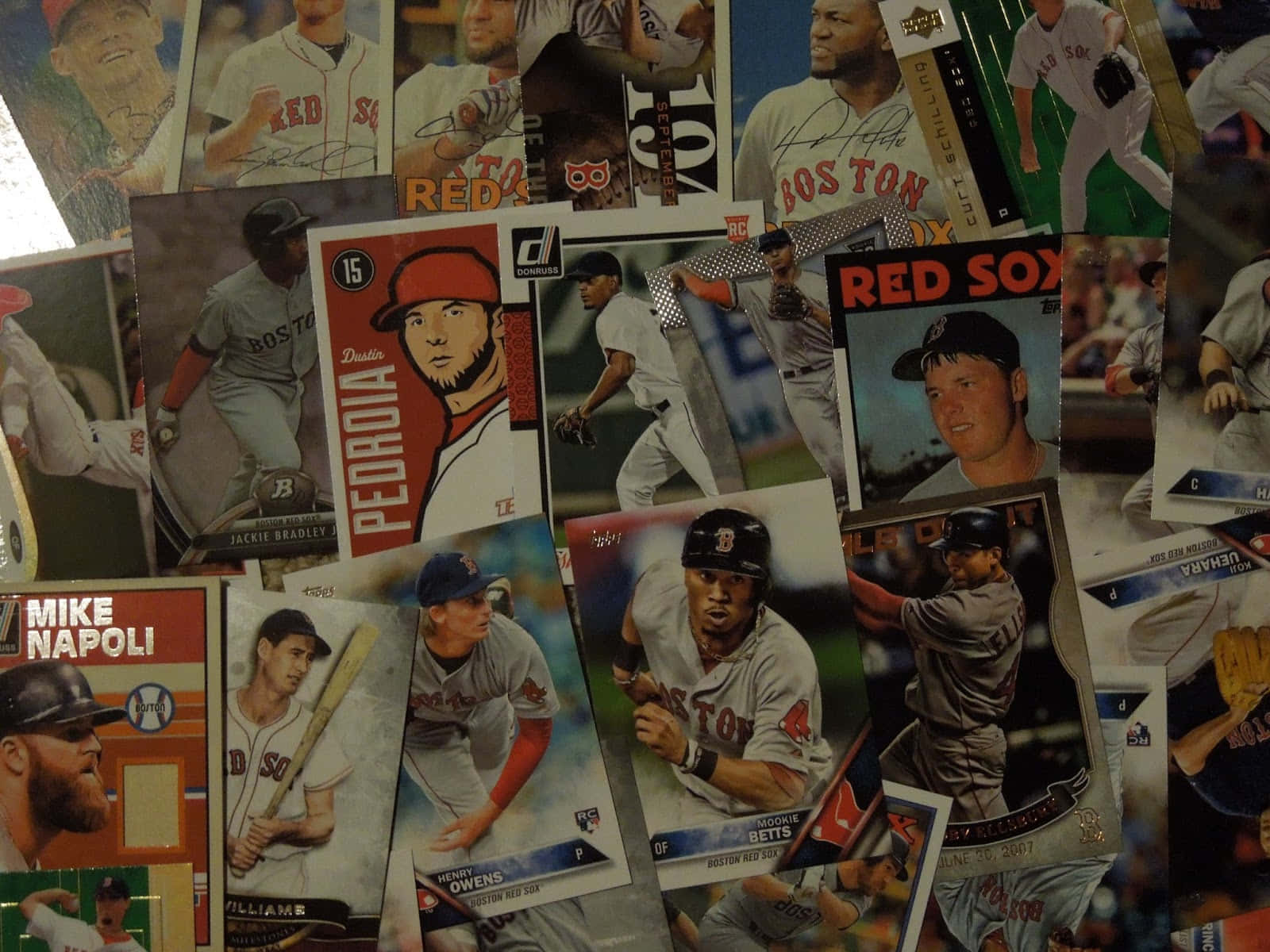 A Stunning Collection Of Vintage Baseball Cards On Display Wallpaper