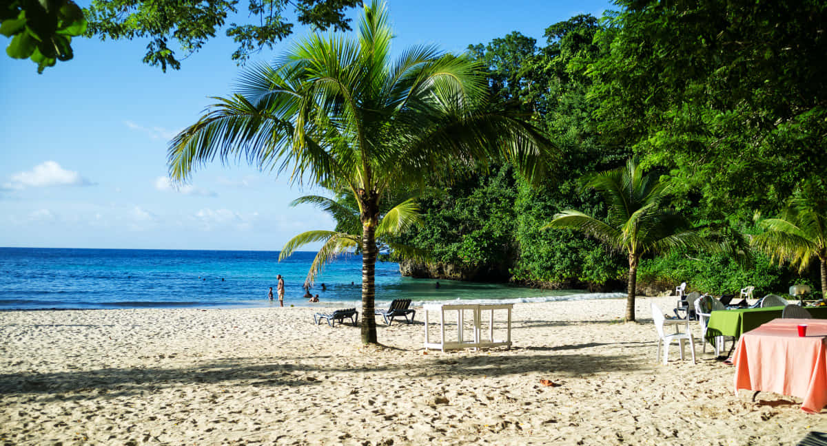 A Stunning Day At Jamaican Beach Wallpaper