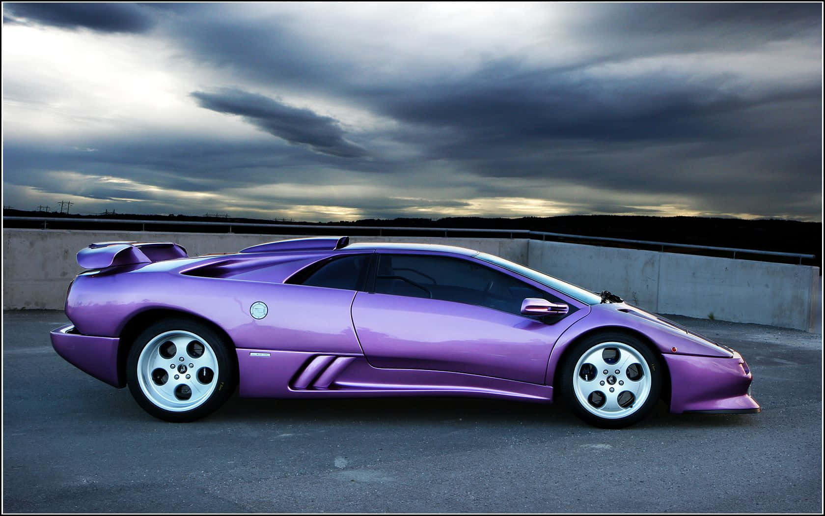 A Stunning Lamborghini Diablo In Vibrant Yellow Wallpaper