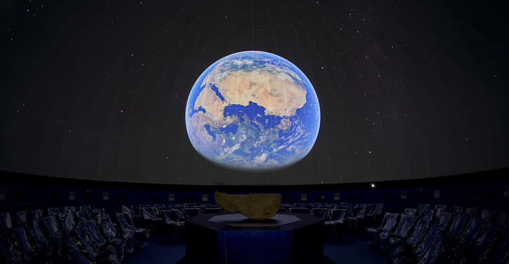 A Stunning Night At The Planetarium Wallpaper