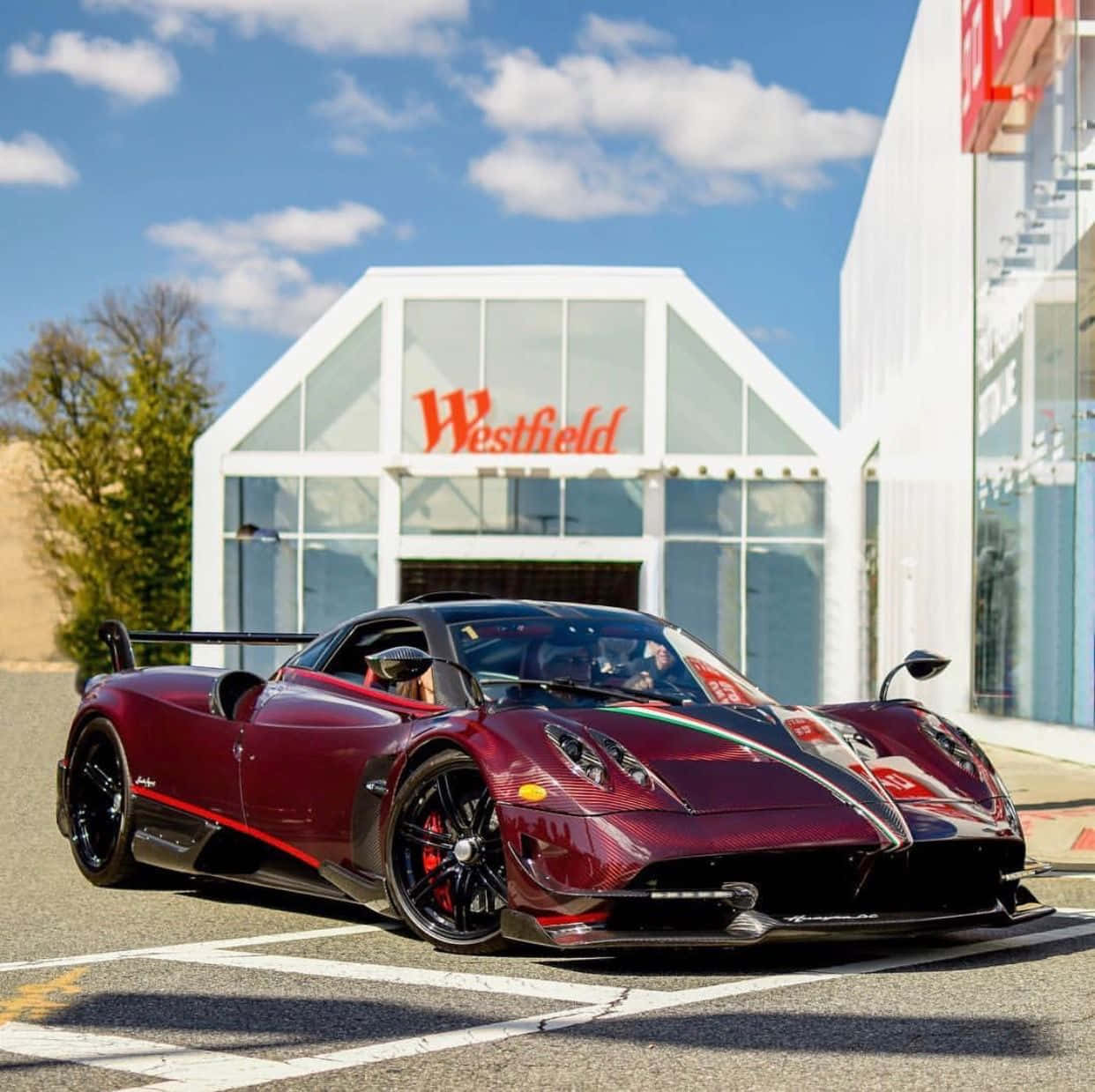 A Stunning Pagani Zonda Tricolore Parked On A Race Track Wallpaper