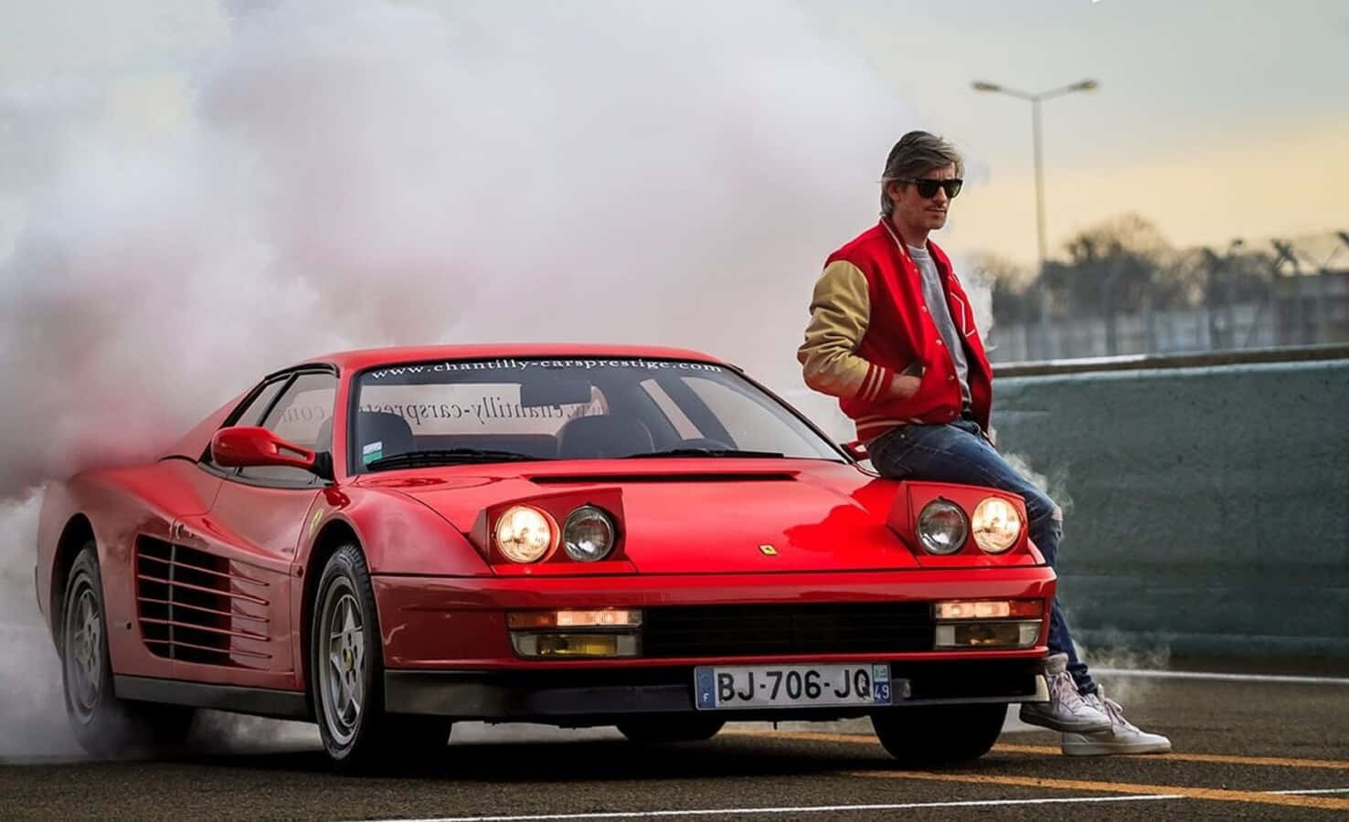 A Stunning Red Ferrari Testarossa In All Its Glory Wallpaper