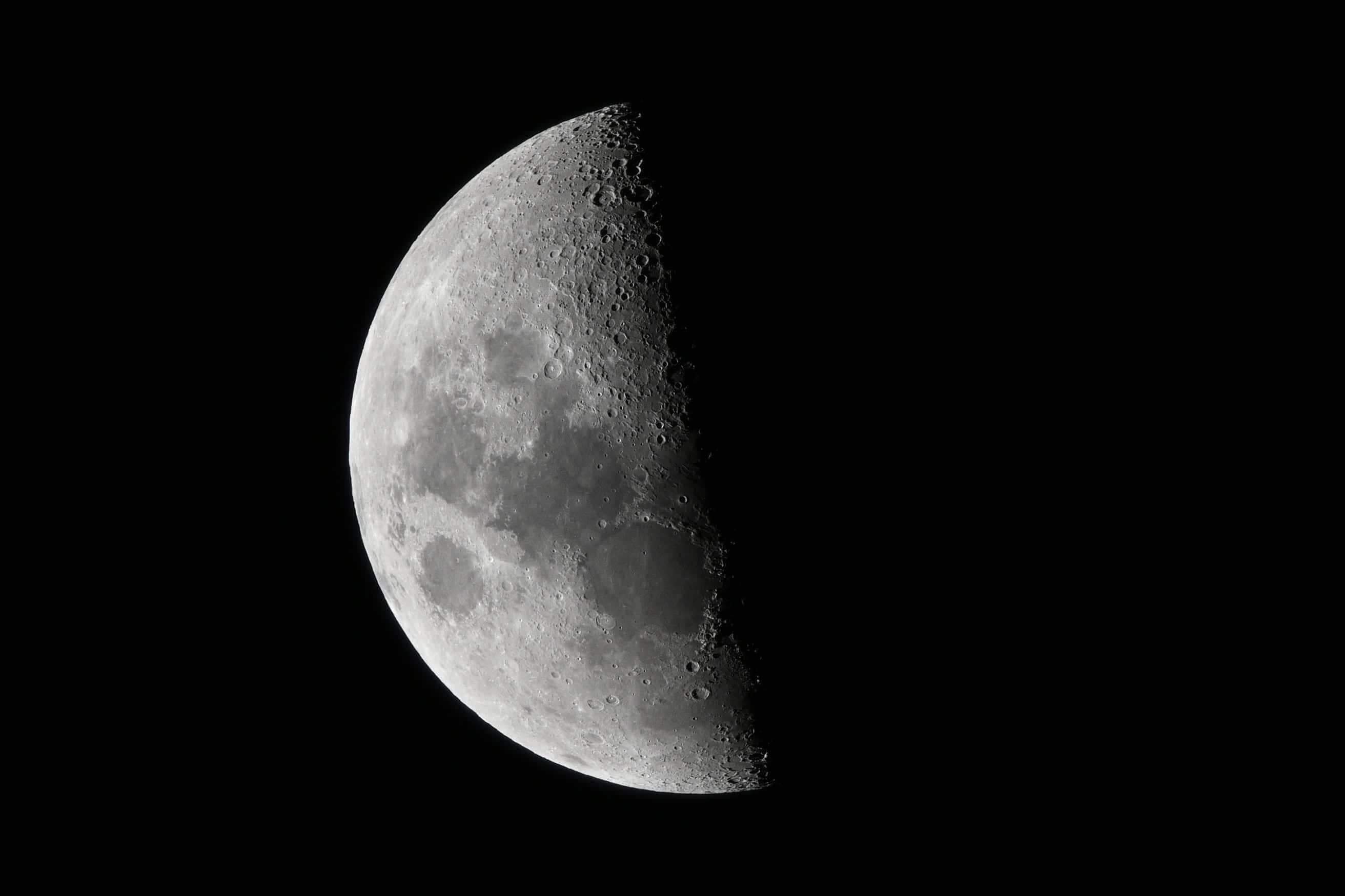 A Stunning View Of Moon Craters Wallpaper