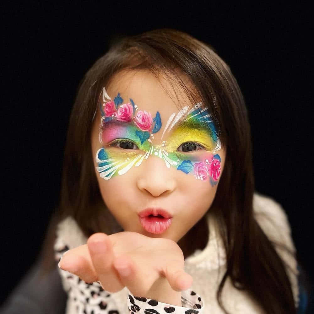 A Sweet And Colorful Butterfly Face Painting Wallpaper