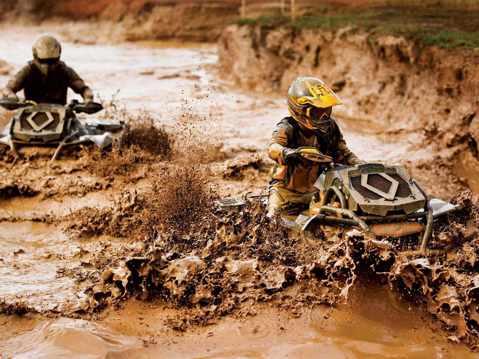 A T V Mud Racing Action Wallpaper