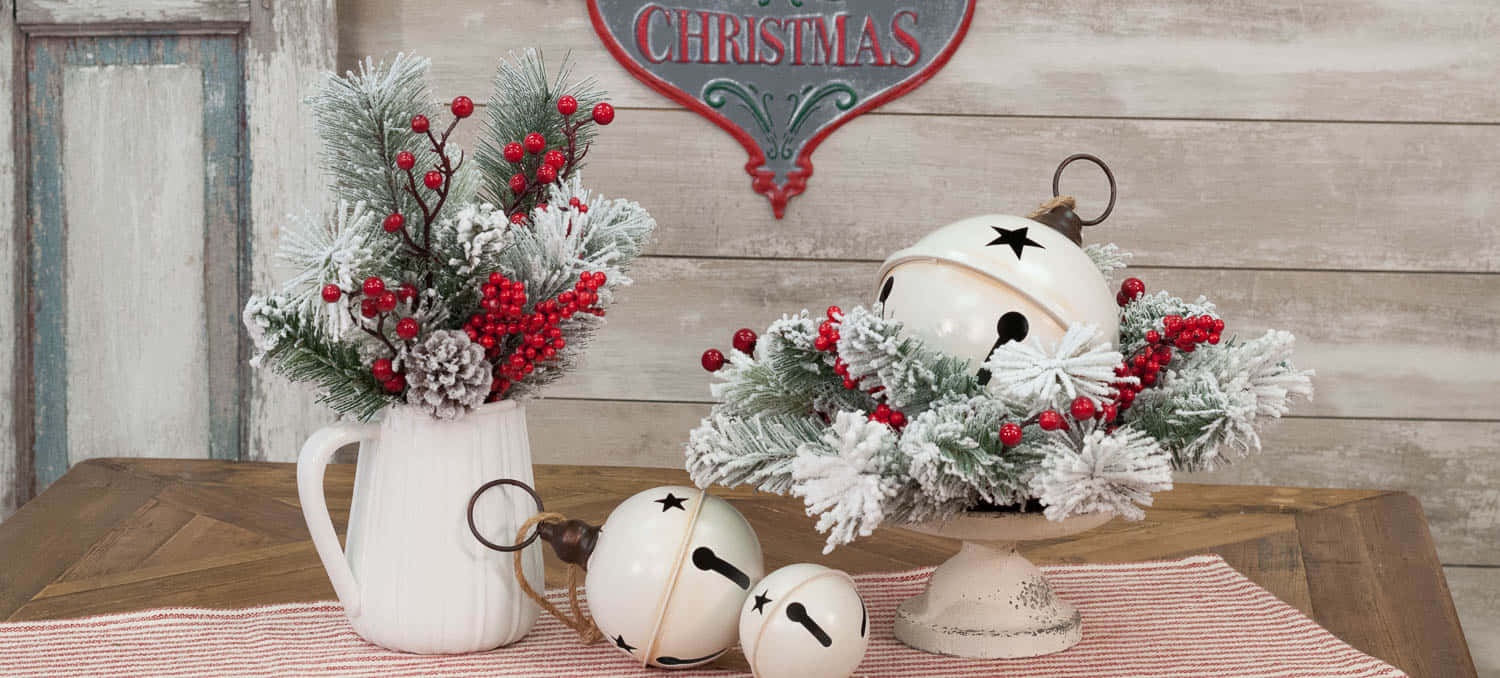 A Table With A Christmas Tree And A Jar Of Berries Wallpaper