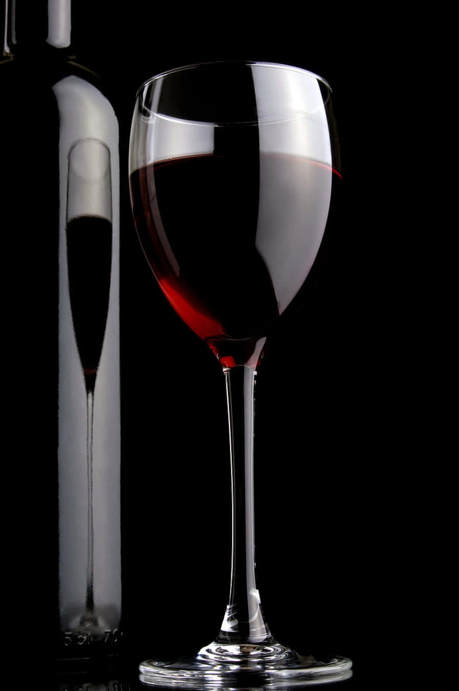 “a Tantalising Glass Of Black Wine” Wallpaper