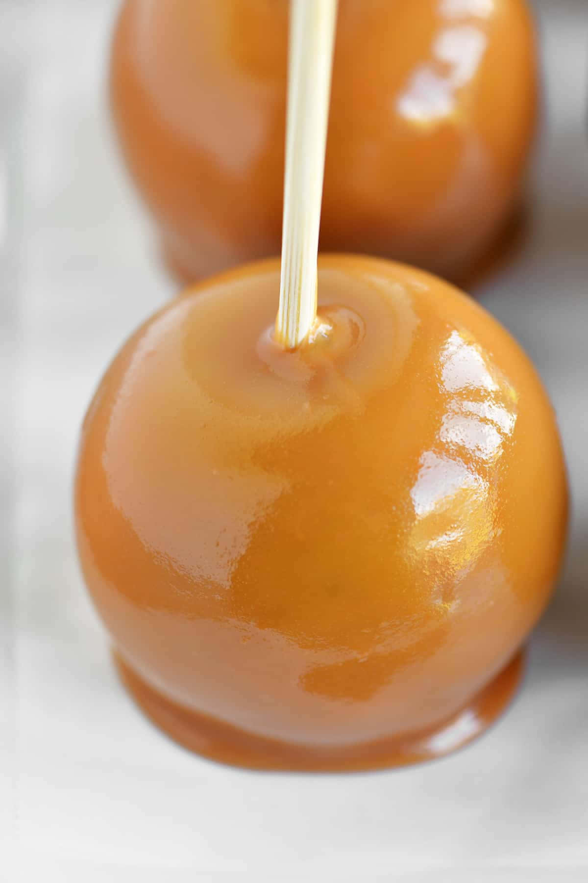 A Tempting Trio Of Caramel Apples Wallpaper