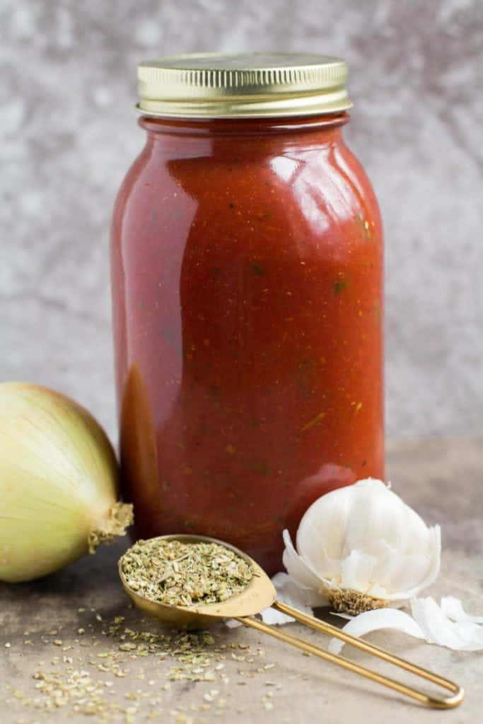 A Thick, Delicious Homemade Red Sauce In A Pan Wallpaper