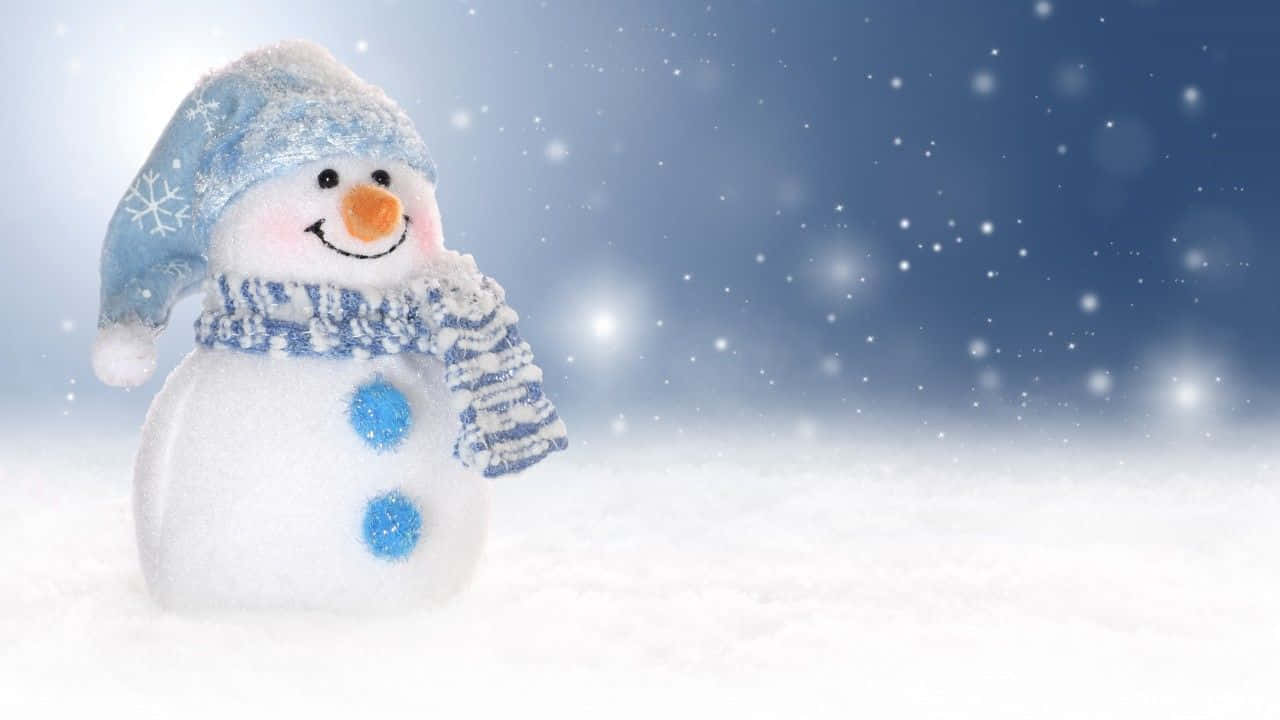 A Traditional Winter Snowman Standing Tall And Proud, Ready For Christmas. Wallpaper