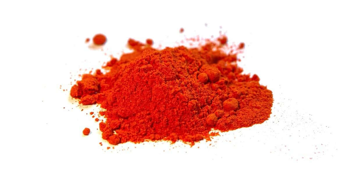 A Vibrant Image Of Red Chili Powder Wallpaper