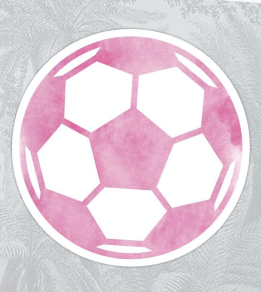 A Vibrant Pink Soccer Ball On A Green Field Wallpaper