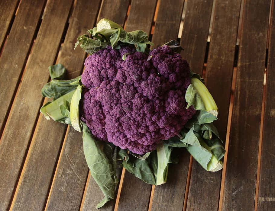 A Vibrant Purple Cauliflower Ready To Be Cooked Wallpaper