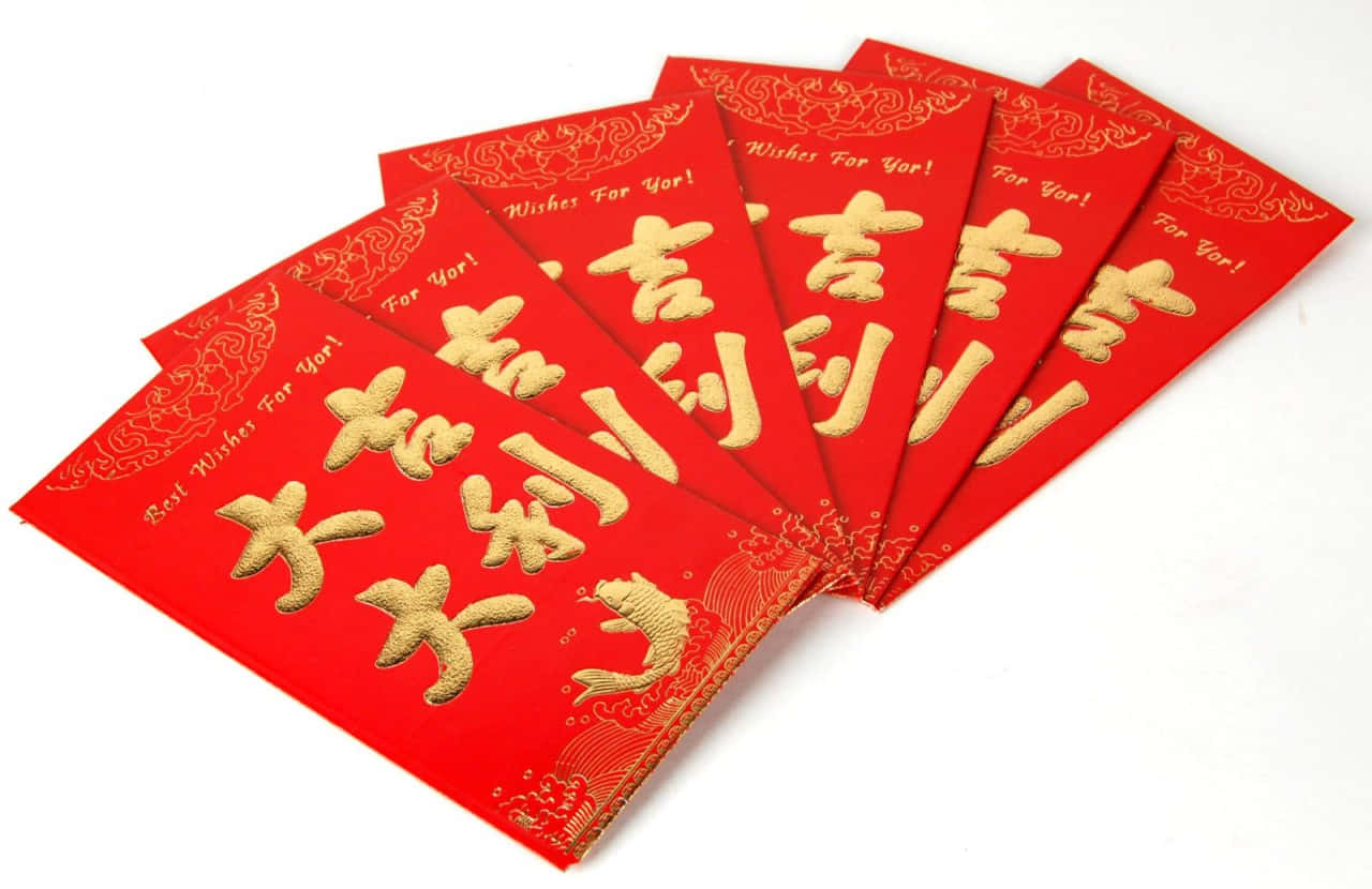 A Vibrant Red Envelope On A Dark Background Wallpaper