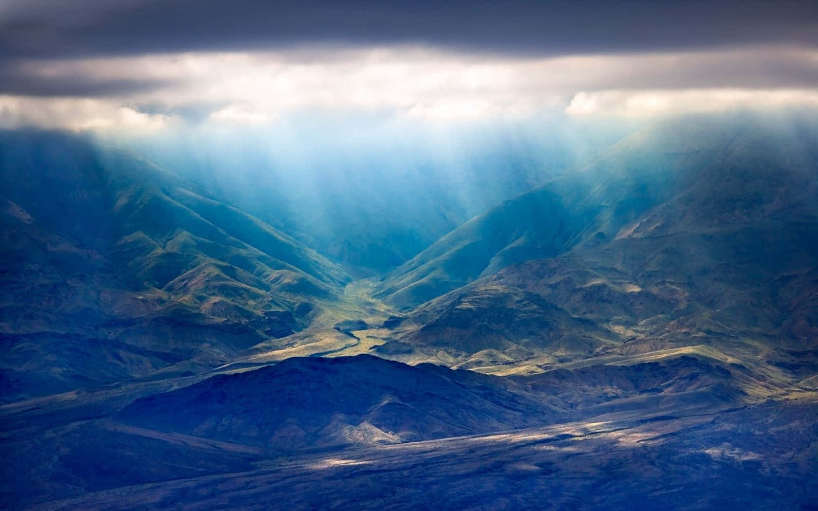 A View Of The Mountains From An Airplane Wallpaper