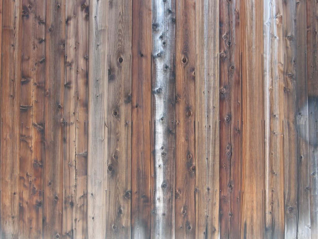 A View Of Weathered Barn Wood Planks Wallpaper