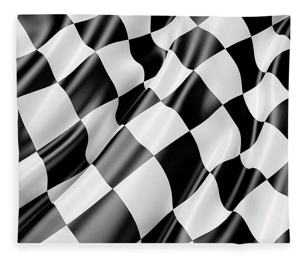 A Waving Chequered Flag On A Race Track Wallpaper