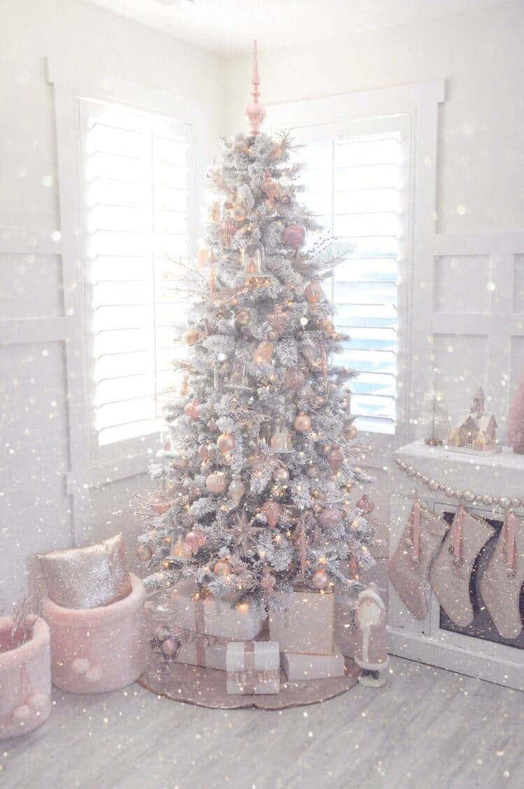 A White And Pink Christmas Tree In A Room Wallpaper