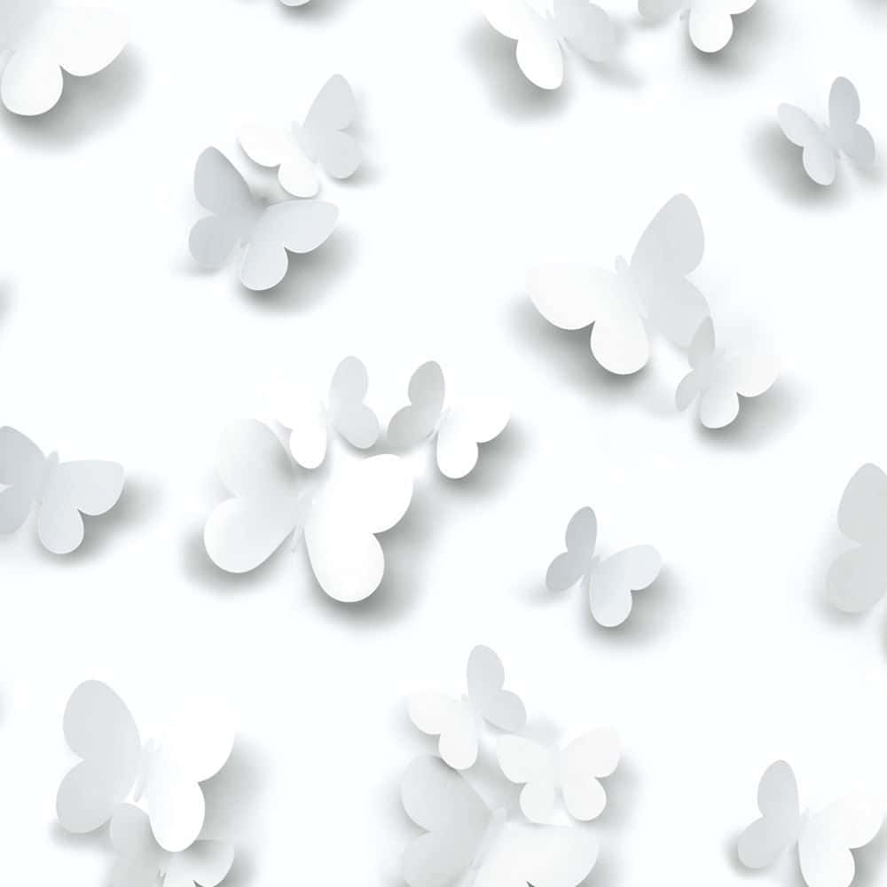 A White Butterfly In A Garden Of Delight Wallpaper