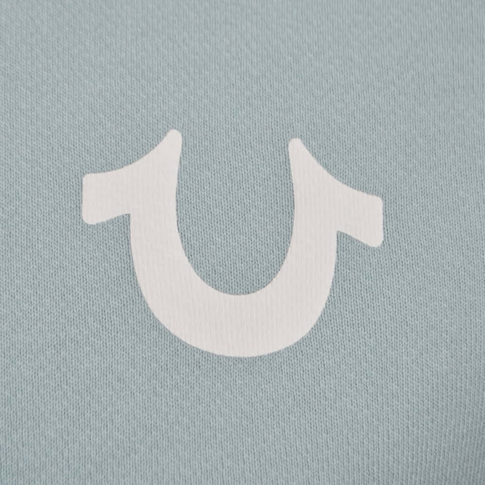 A White Horse Logo On A Blue Shirt Wallpaper