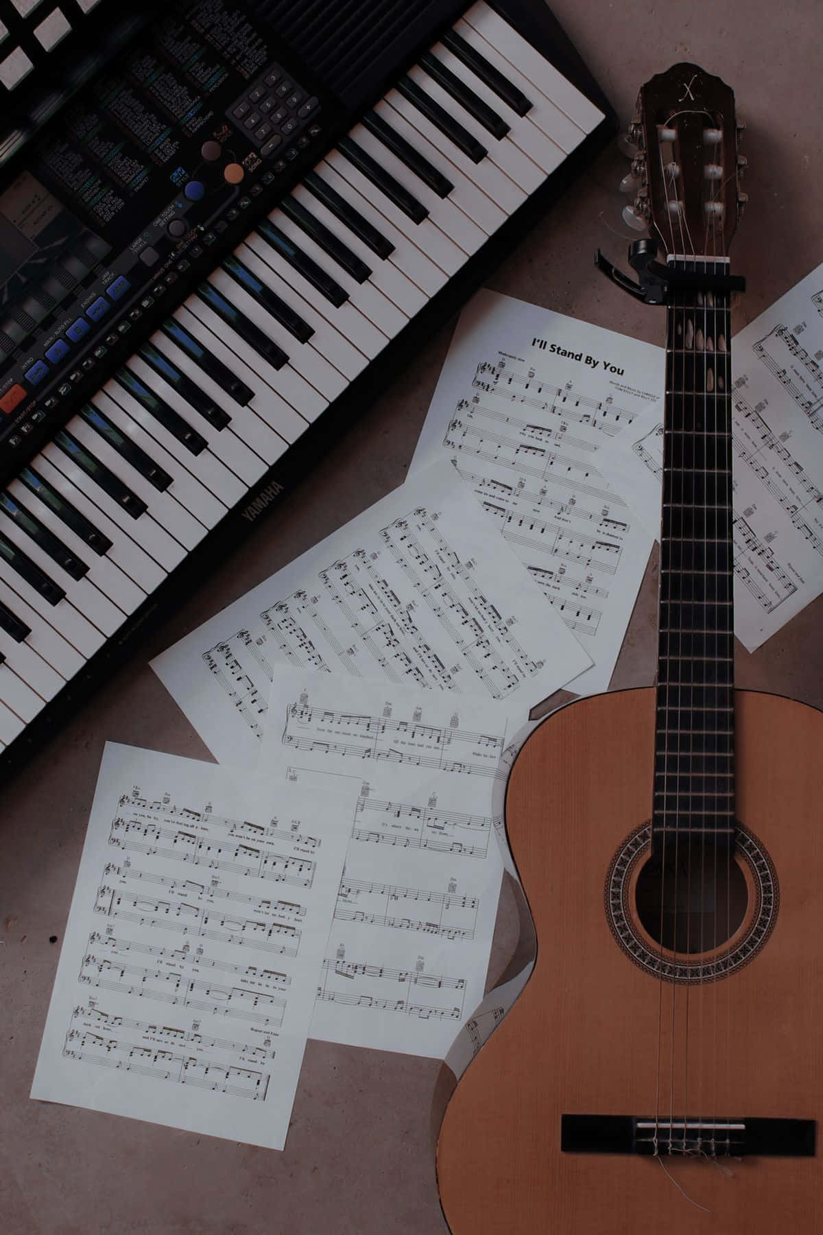 Acoustic Guitar On A Table Wallpaper