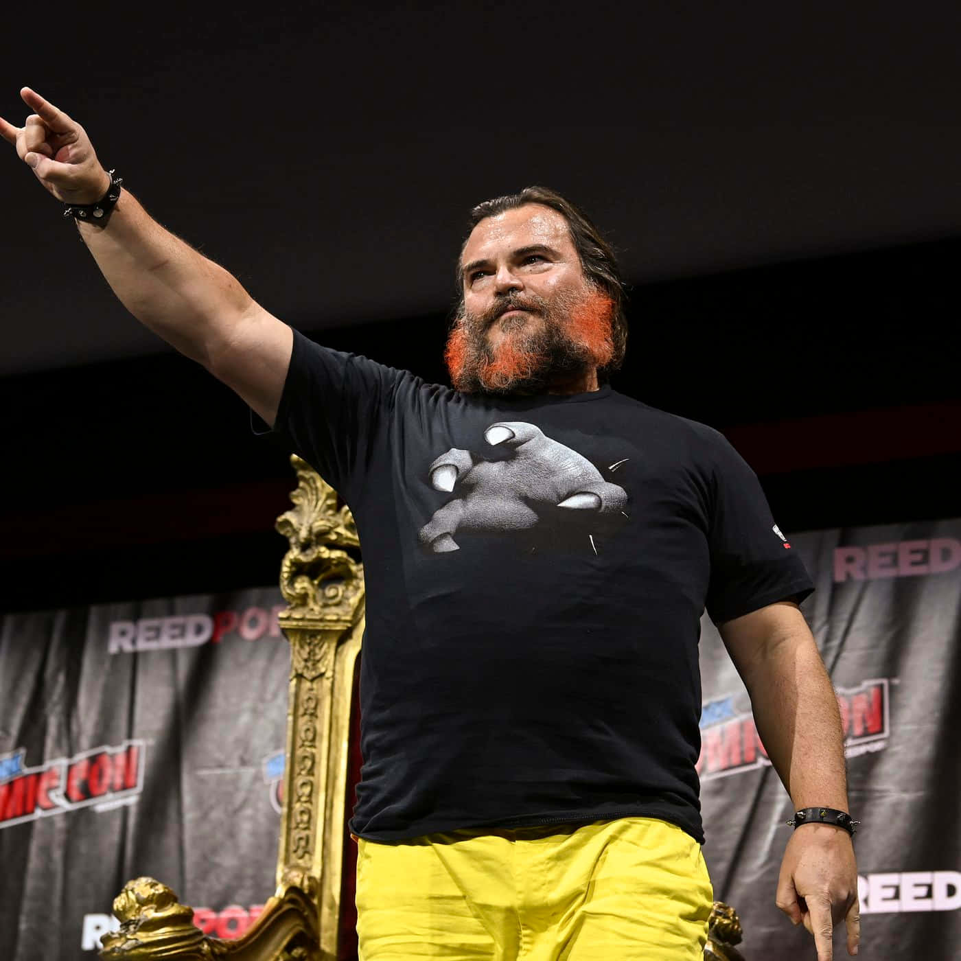 Actor Jack Black Looks Sharp In A Classic White T-shirt And Black Leather Jacket Wallpaper