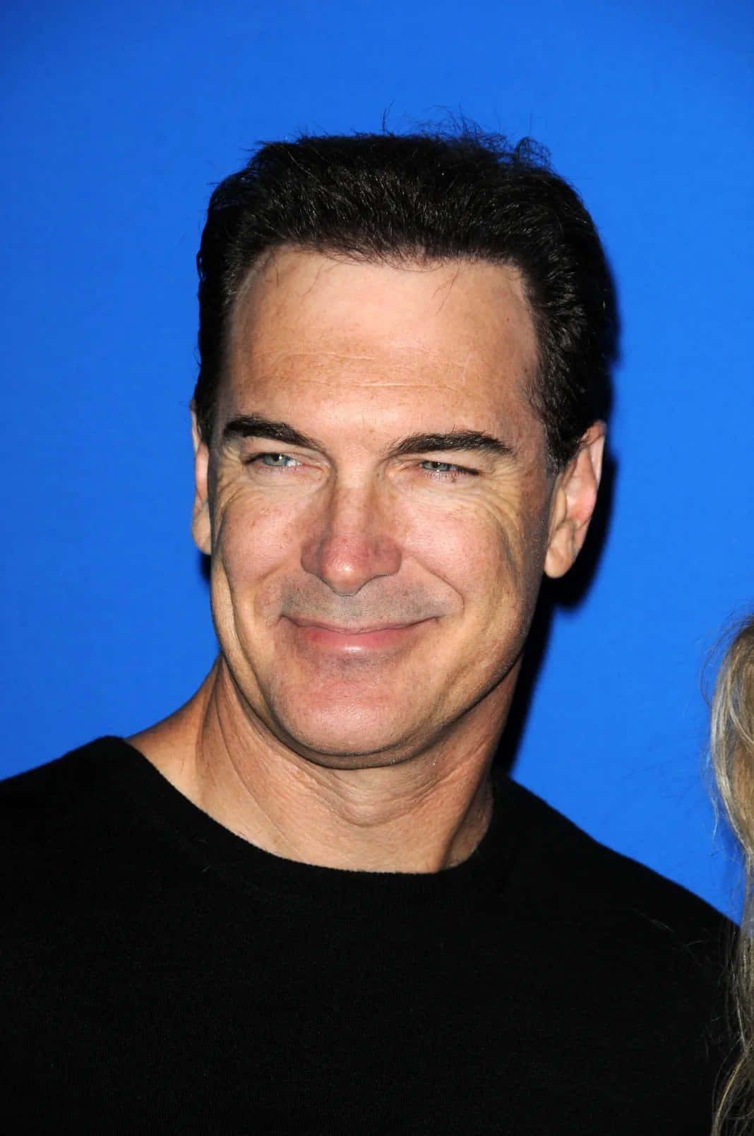 Actor Patrick Warburton Attends A Red Carpet Event Wallpaper