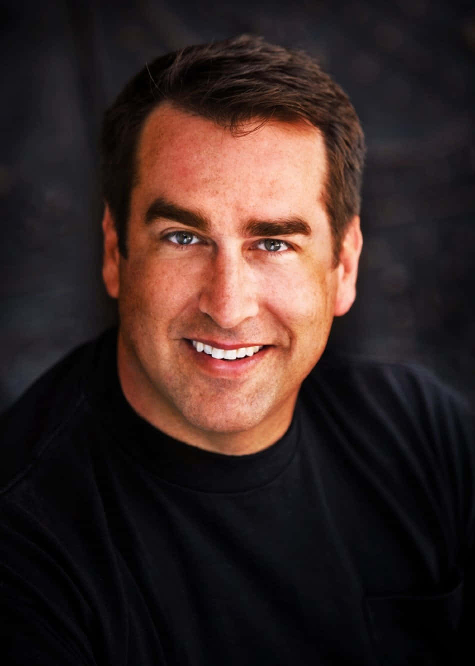 Actor Rob Riggle Smiles For The Camera Wallpaper