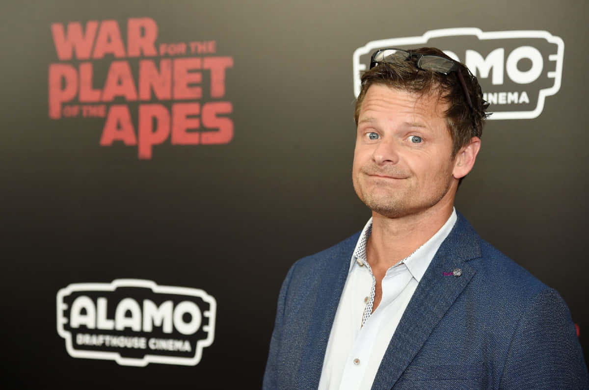 Actor Steve Zahn Grinning While Attending A Movie Premiere Wallpaper