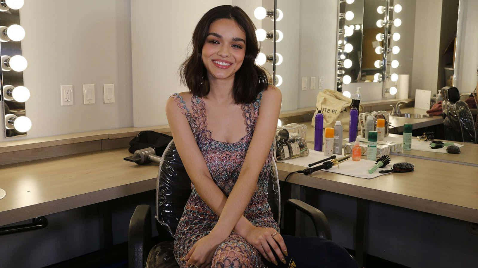 Actress Smilingin Makeup Room Wallpaper